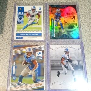 4 card Amon Ra St Brown lot.